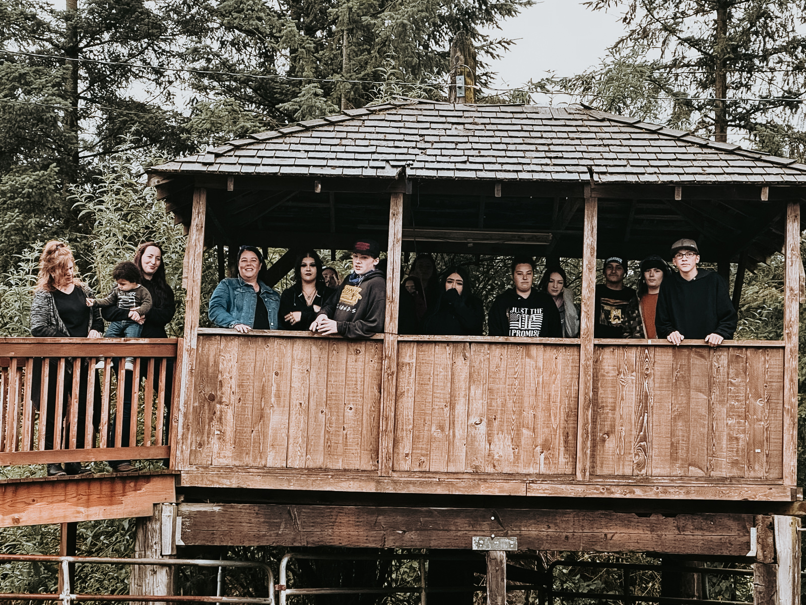 Group of teens in a wooden treehouse